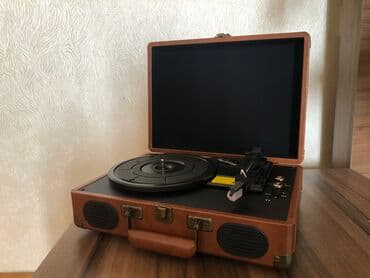 Retro patefon val oxudan. Yenidir Retro dizaynlı, müasir funksiyalara lalafo.az -da Retro patefon val oxudan. Yenidir Retro dizaynlı, müasir funksiyalara
