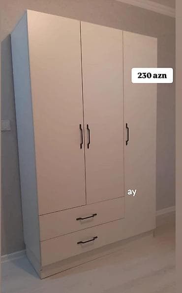 Ağ rəngli üç qapılı paltar dolabı. - Minimalist dizayn, düz səthlər lalafo.az -da Ağ rəngli üç qapılı paltar dolabı. - Minimalist dizayn, düz səthlər