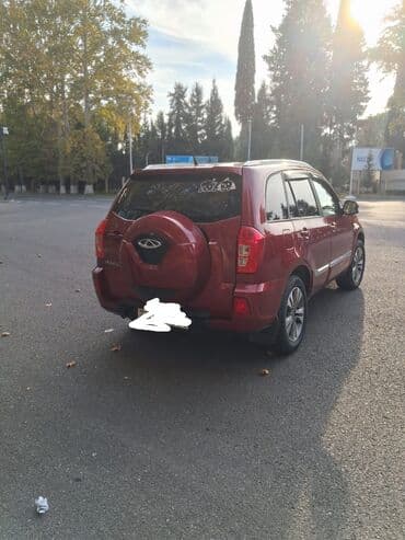 Chery Tiggo (T11) krossover - Kuzov: 5 qapılı, tünd qırmızı rəng - lalafo.az -da Chery Tiggo (T11) krossover - Kuzov: 5 qapılı, tünd qırmızı rəng -