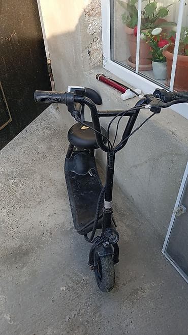 Elektrik skuter – oturacaqlı model - Rəng: qara - Oturacaq: yumşaq lalafo.az -da Elektrik skuter – oturacaqlı model - Rəng: qara - Oturacaq: yumşaq