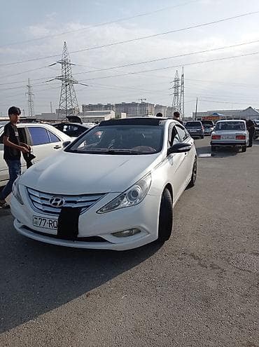 Hyundai Sonata (ağ rəng), sedan gövdə. - Güclü benzin mühərriki, ön lalafo.az -da Hyundai Sonata (ağ rəng), sedan gövdə. - Güclü benzin mühərriki, ön