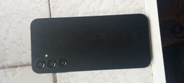 Məhsul: Qara rəngli smartfon 128/4. GB. 5000map pil qimət lalafo.az -da Məhsul: Qara rəngli smartfon 128/4. GB. 5000map pil qimət