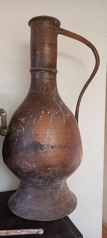 Antik kolleksiya – mis su qabı, köhnə samovar və iki ədəd mexaniki qol lalafo.az -da Antik kolleksiya – mis su qabı, köhnə samovar və iki ədəd mexaniki qol