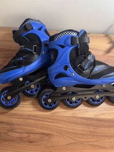 Mavi-qaranlıq rəng sxemində inline konki (rolik). - 4 təkərli dizayn lalafo.az -da Mavi-qaranlıq rəng sxemində inline konki (rolik). - 4 təkərli dizayn