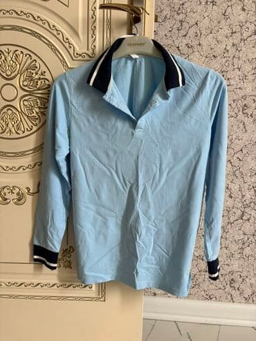 Uzunqol mavi polo köynək - Rəng: Açıq mavi - Qol: Uzunqol - Yaxa lalafo.az -da Uzunqol mavi polo köynək - Rəng: Açıq mavi - Qol: Uzunqol - Yaxa