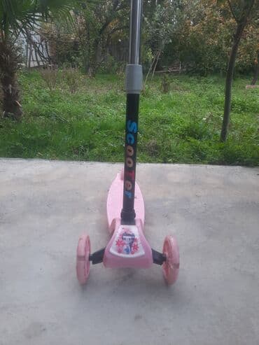 Uşaq skutu – 3 təkərli, “Scooter” yazılı model - Rəng: açıq çəhrayı - lalafo.az -da Uşaq skutu – 3 təkərli, “Scooter” yazılı model - Rəng: açıq çəhrayı -