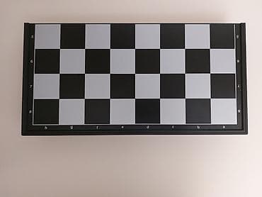 Şahmat dəsti – qatlanan lövhə və tam fiqurlar komplekti Şahmat tam lalafo.az -da Şahmat dəsti – qatlanan lövhə və tam fiqurlar komplekti Şahmat tam