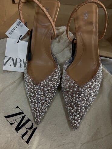 ZARA brendinin incə detallarla işlənmiş qadın ayaqqabısı. 160la alinib lalafo.az -da ZARA brendinin incə detallarla işlənmiş qadın ayaqqabısı. 160la alinib