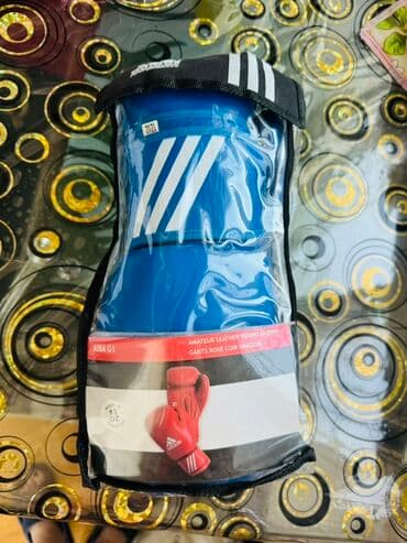 Adidas markasına məxsus mavi rəngli boks əlcəkləri. Əlcəklər "Amateur lalafo.az -da — 2 Adidas markasına məxsus mavi rəngli boks əlcəkləri. Əlcəklər "Amateur — 2