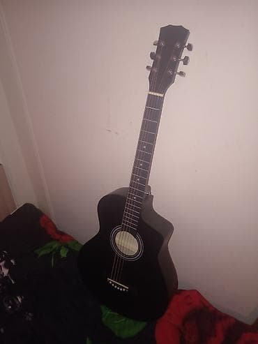 Akustik gitara – qara rəng, kəsik korpus (cutaway) dizaynı lalafo.az -da Akustik gitara – qara rəng, kəsik korpus (cutaway) dizaynı