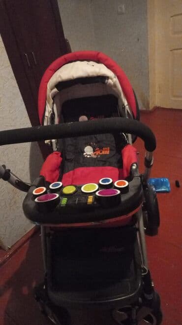 Uşaq arabası – qırmızı/qara rəng çalarlarında, geniş oturacaq və lalafo.az -da Uşaq arabası – qırmızı/qara rəng çalarlarında, geniş oturacaq və