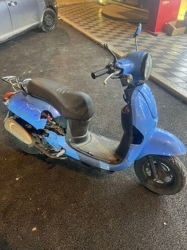 Mavi rəngli şəhər skuter - Korpus: kompakt, klassik yuvarlaq faralı lalafo.az -da Mavi rəngli şəhər skuter - Korpus: kompakt, klassik yuvarlaq faralı