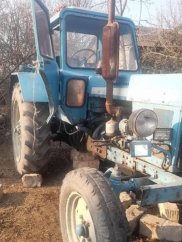 Mavi rəngli tək kabinəli təkərli traktor Texniki xüsusiyyətlər və lalafo.az -da — 2 Mavi rəngli tək kabinəli təkərli traktor Texniki xüsusiyyətlər və — 2