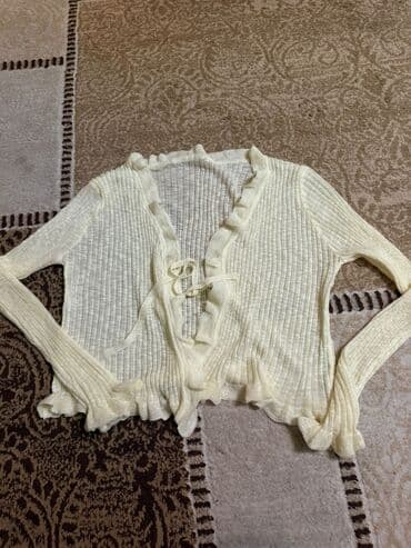 Zərif, açıq krem rəngli qadın kardiqanı. - Material: nazik, elastik və lalafo.az -da Zərif, açıq krem rəngli qadın kardiqanı. - Material: nazik, elastik və