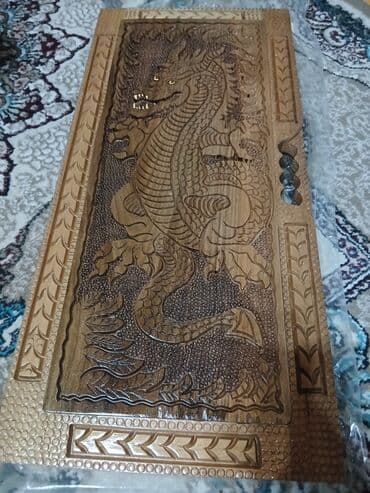 Bu, qoz agacından hazırlanmış oyma naxışlı, qatlanabilən nərd lalafo.az -da Bu, qoz agacından hazırlanmış oyma naxışlı, qatlanabilən nərd