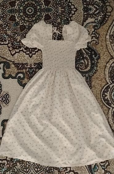 Ağ rəngli, xırda çiçək naxışlı midi don. - Üst hissə: elastik “smock” lalafo.az -da Ağ rəngli, xırda çiçək naxışlı midi don. - Üst hissə: elastik “smock”