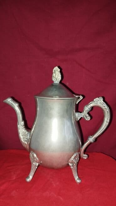 Məhsul: Metal çay/qəhvə çayniki – Melexiyor ayaqlı, qapaqlı Təsvir: - lalafo.az -da Məhsul: Metal çay/qəhvə çayniki – Melexiyor ayaqlı, qapaqlı Təsvir: -