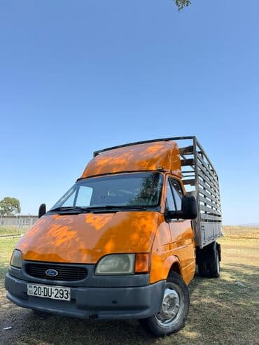 Narıncı rəngli, taxta bortlu, arxasında ikili təkərləri olan "Ford lalafo.az -da Narıncı rəngli, taxta bortlu, arxasında ikili təkərləri olan "Ford