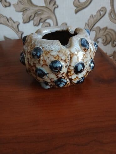 Keramik külqabı, qəhvəyi və ağ rənglərin qarışığı ilə, qabarıq lalafo.az -da Keramik külqabı, qəhvəyi və ağ rənglərin qarışığı ilə, qabarıq