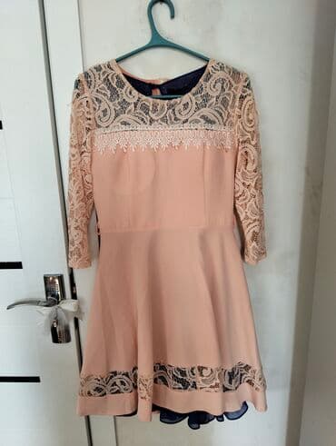 Zərif dizaynlı qızılı-çəhrayı rəngli qadın paltarı. - Üst hissə və lalafo.az -da Zərif dizaynlı qızılı-çəhrayı rəngli qadın paltarı. - Üst hissə və