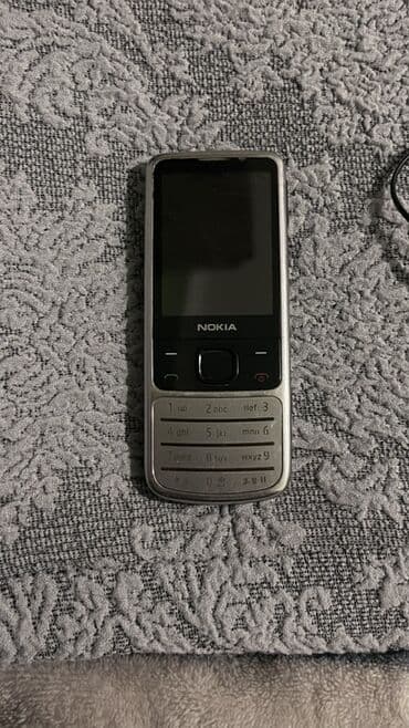 Nokia 6700 Slide, rəng - Gümüşü, Düyməli lalafo.az -da Nokia 6700 Slide, rəng - Gümüşü, Düyməli