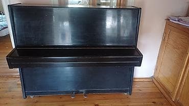 Qara rəngli, klassik üslubda akustik pianino. Korpus upright tipdədir lalafo.az -da Qara rəngli, klassik üslubda akustik pianino. Korpus upright tipdədir