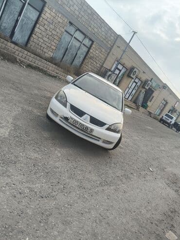 Mitsubishi Lancer, ağ rəng, sedan gövdə. Xüsusiyyətlər: - Ön lalafo.az -da Mitsubishi Lancer, ağ rəng, sedan gövdə. Xüsusiyyətlər: - Ön