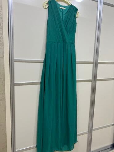 Uzun yaşıl don - Model: Maxi uzunluqda, qolsuz - Yaxa: Çarpaz V-yaxa lalafo.az -da Uzun yaşıl don - Model: Maxi uzunluqda, qolsuz - Yaxa: Çarpaz V-yaxa