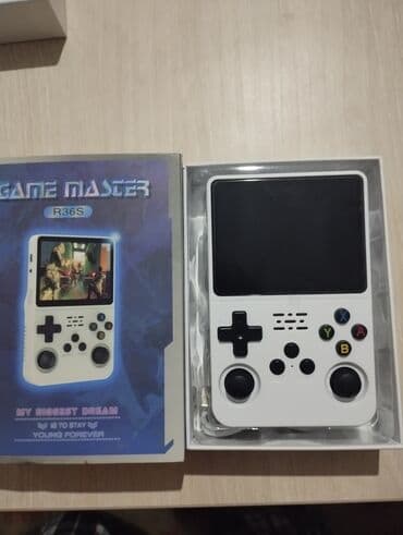 Ağ rəngdə "GAME MASTER R36S" modelli portativ oyun konsolu. Konsol əl lalafo.az -da Ağ rəngdə "GAME MASTER R36S" modelli portativ oyun konsolu. Konsol əl