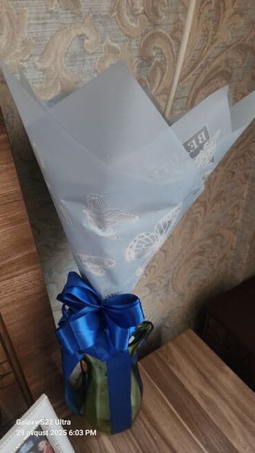 15 deneli mavi lentle hazirlanmiw gozel buket Ebedi xatire qalacaq lalafo.az -da 15 deneli mavi lentle hazirlanmiw gozel buket Ebedi xatire qalacaq