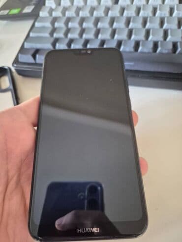 Huawei P20 Lite, 64 GB, rəng - Qara, Barmaq izi lalafo.az -da Huawei P20 Lite, 64 GB, rəng - Qara, Barmaq izi