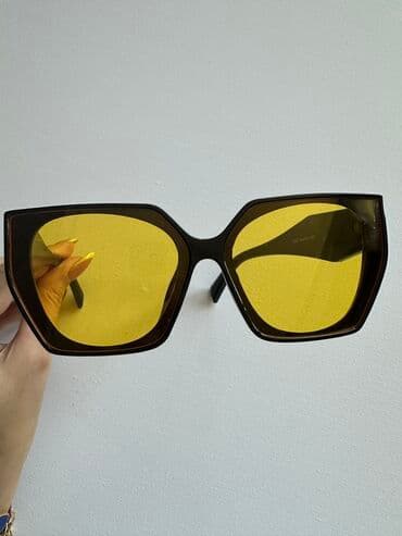 Солнцезащитные очки в стильной чёрной оправе с жёлтыми линзами lalafo.az -da Солнцезащитные очки в стильной чёрной оправе с жёлтыми линзами