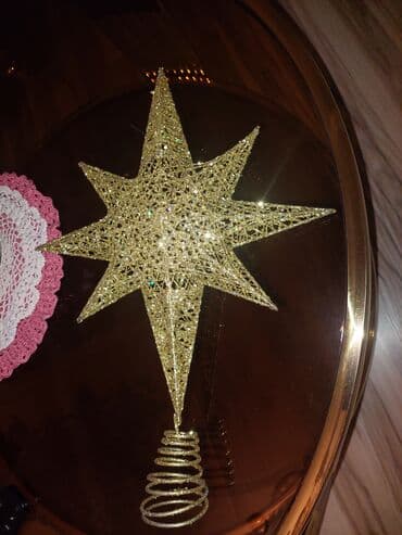 Parlaq qızılı rəngdə Yeni il ağacı üçün ulduz başlıq. Böyük ölçüdə - lalafo.az -da Parlaq qızılı rəngdə Yeni il ağacı üçün ulduz başlıq. Böyük ölçüdə -