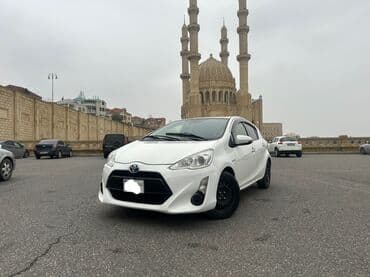 Toyota Aqua (Prius C) hibrid hetçbek qalmaq şərti ilə icarəyə verilir lalafo.az -da Toyota Aqua (Prius C) hibrid hetçbek qalmaq şərti ilə icarəyə verilir