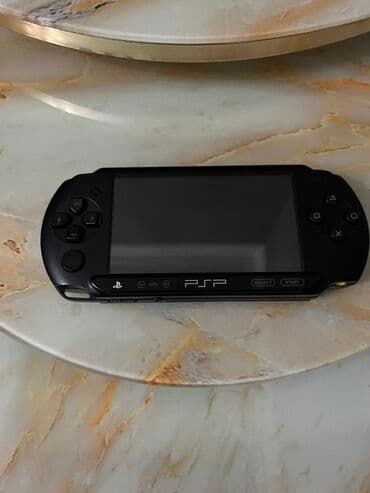 Sony PSP portativ oyun konsolu - Rəng: Qara - Ön paneldə geniş LCD lalafo.az -da Sony PSP portativ oyun konsolu - Rəng: Qara - Ön paneldə geniş LCD