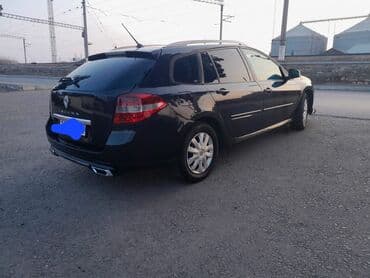 Renault Laguna Grandtour (universał) – qara rəng, geniş və praktik lalafo.az -da Renault Laguna Grandtour (universał) – qara rəng, geniş və praktik