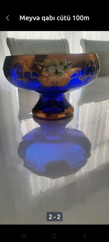 Göylə mavi rəngdə və qızılı rəngli naxışlarla bəzədilmiş bu zərif lalafo.az -da Göylə mavi rəngdə və qızılı rəngli naxışlarla bəzədilmiş bu zərif