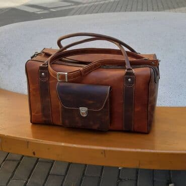 Təbii dəridən tamamilə əl işi olan çanta. İribuynuzlu heyvanın lalafo.az -da Təbii dəridən tamamilə əl işi olan çanta. İribuynuzlu heyvanın