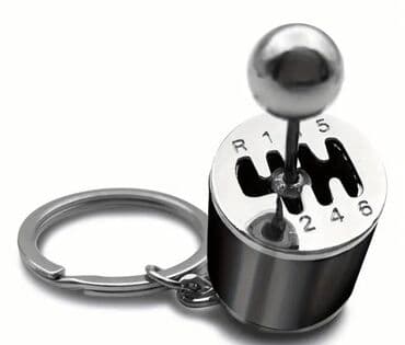 Mexaniki sürətlər qutusunun keçid sxemini əks etdirən metal açarlıq lalafo.az -da Mexaniki sürətlər qutusunun keçid sxemini əks etdirən metal açarlıq