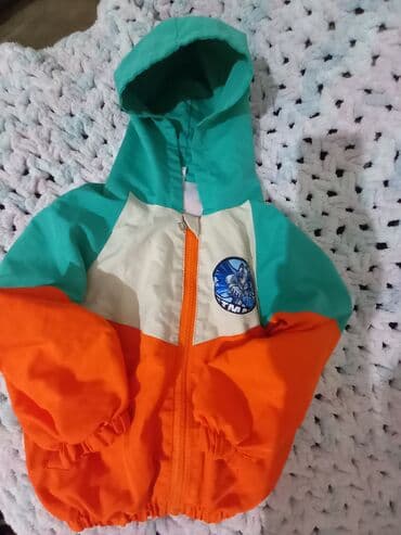 Uşaq küləklikli yüngül gödəkçə - Rənglər: narıncı, krem və firuzə lalafo.az -da Uşaq küləklikli yüngül gödəkçə - Rənglər: narıncı, krem və firuzə