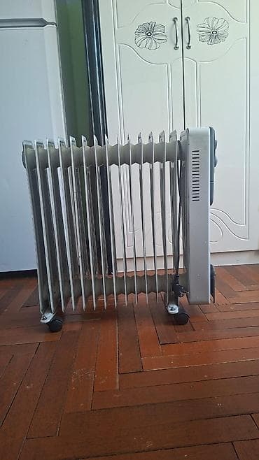 Yağlı radiator (elektrikli) - 11 bölməli klassik yağ radiatoru - Güc at lalafo.az Yağlı radiator (elektrikli) - 11 bölməli klassik yağ radiatoru - Güc