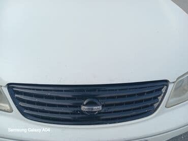 Радиаторы отопителей: Nissan ön radiator barmaqlığı - Orijinal Nissan emblemi ilə - Qara at lalafo.az — 1 Радиаторы отопителей: Nissan ön radiator barmaqlığı - Orijinal Nissan emblemi ilə - Qara — 1
