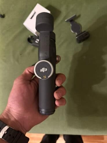 DJI Osmo Mobile seriyasına aid smartfon stabilizatoru (gimbal) lalafo.az -da DJI Osmo Mobile seriyasına aid smartfon stabilizatoru (gimbal)