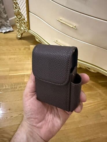 Siqaret qutusu və alışqan üçün nəzərdə tutulmuş bu qəhvəyi rəngli qab lalafo.az -da Siqaret qutusu və alışqan üçün nəzərdə tutulmuş bu qəhvəyi rəngli qab